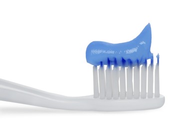 Photo of Plastic toothbrush with paste on white background, closeup