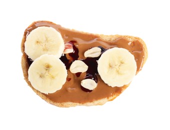 Photo of Toast with tasty nut butter, banana slices, jam and peanuts isolated on white, top view