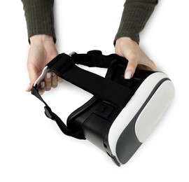 Woman with virtual reality headset on white background, top view