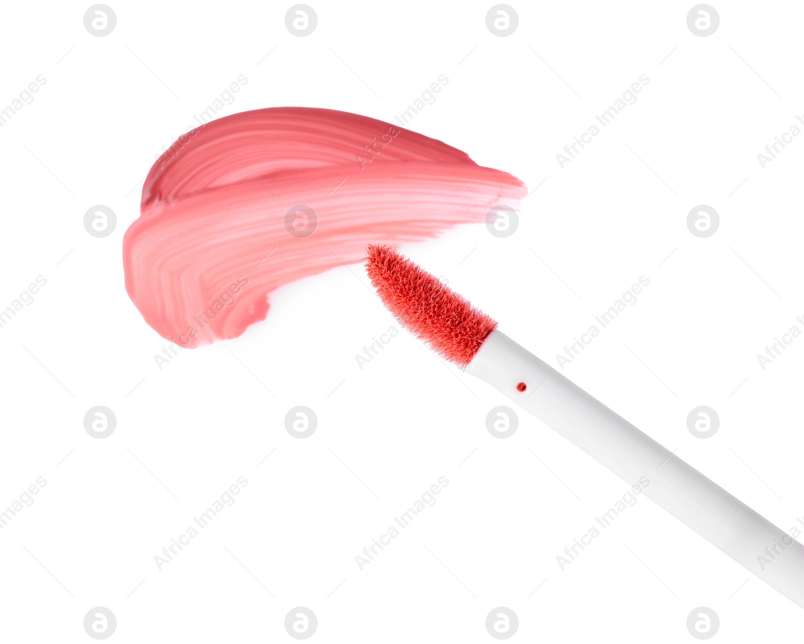 Photo of Strokes of color lip glosses and applicator isolated on white, top view