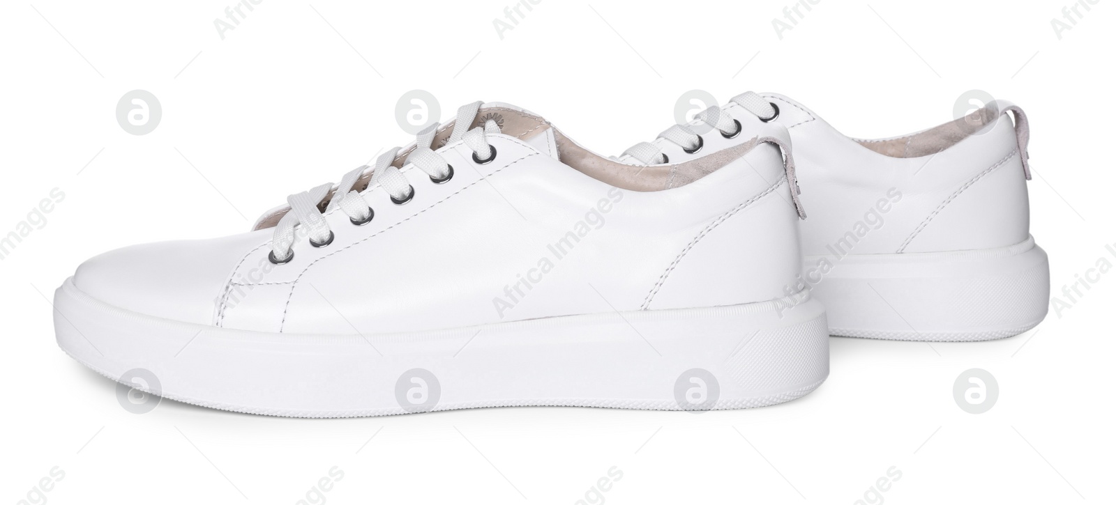 Photo of Pair of stylish sneakers isolated on white