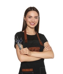 Photo of Portrait of happy hairdresser with professional scissors on white background