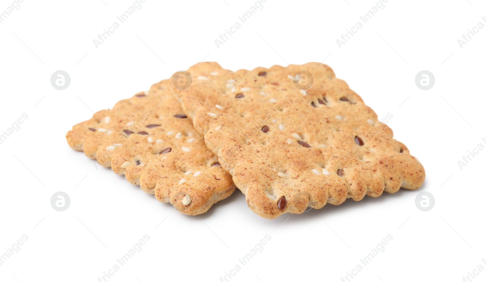 Photo of Cereal crackers with flax and sesame seeds isolated on white