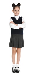 Photo of Happy girl in school uniform on white background