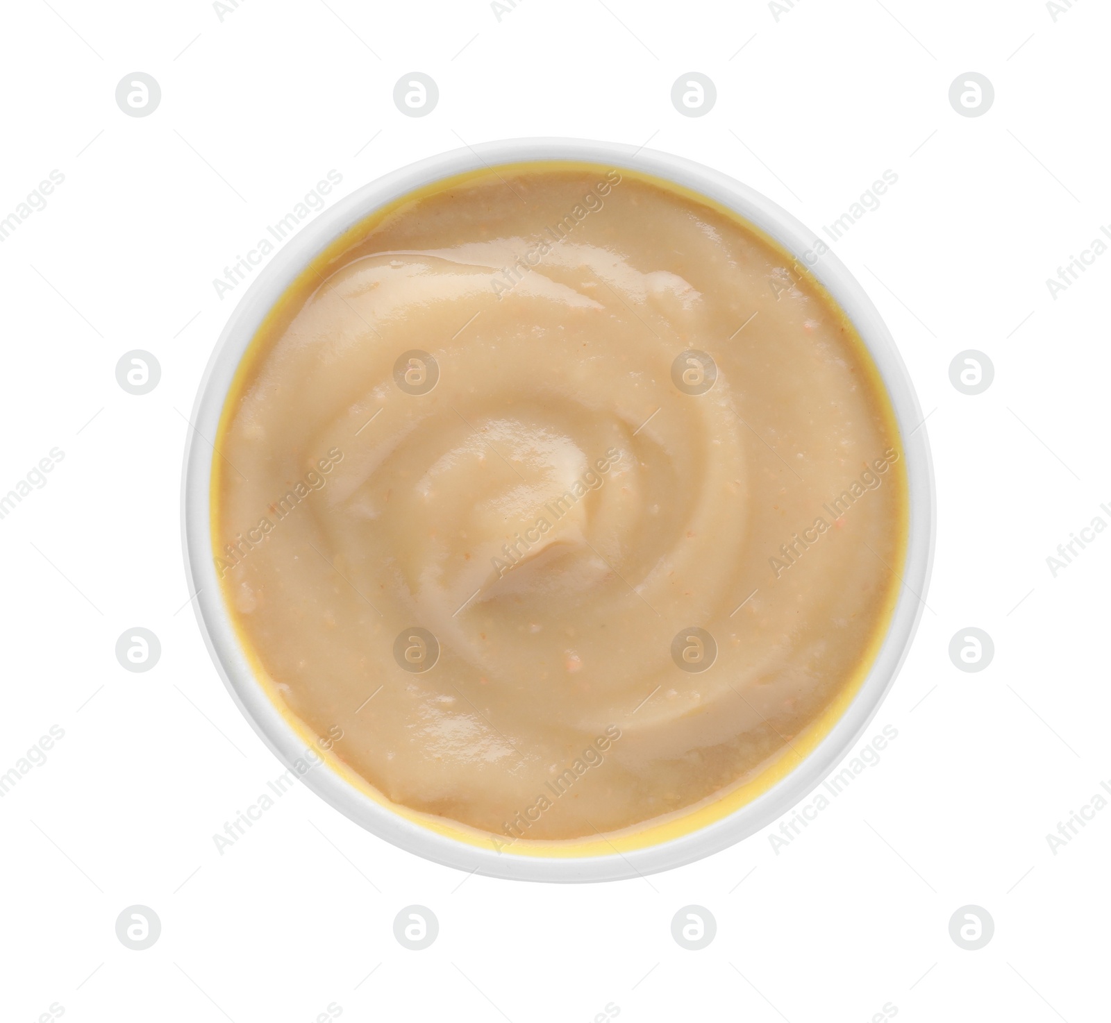 Fruit puree in bowl on white background, top view Photo of Fruit puree in bowl on white background, top view