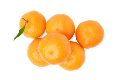 Photo of Fresh ripe juicy tangerines with green leaf isolated on white, top view