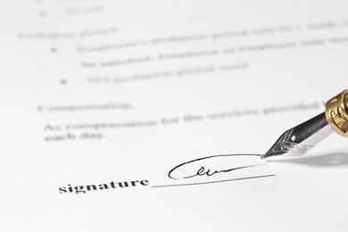 Photo of Signing notary document with fountain pen, closeup. Space for text
