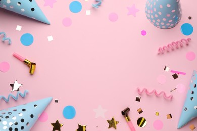 Frame of party items on pink background, flat lay. Space for text