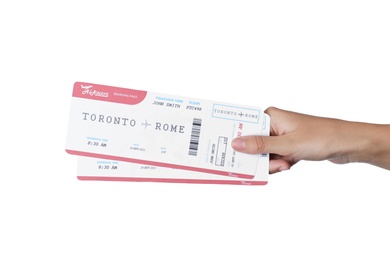 Photo of Woman holding tickets on white background, closeup. Travel agency concept