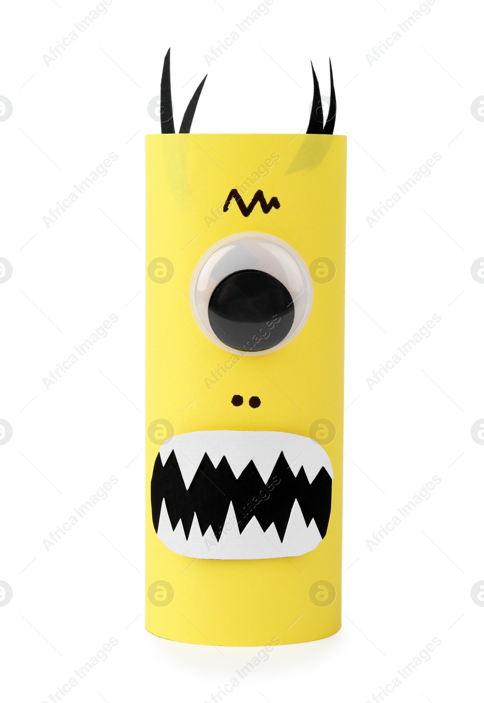 Photo of Monster made of yellow paper isolated on white. Halloween decoration