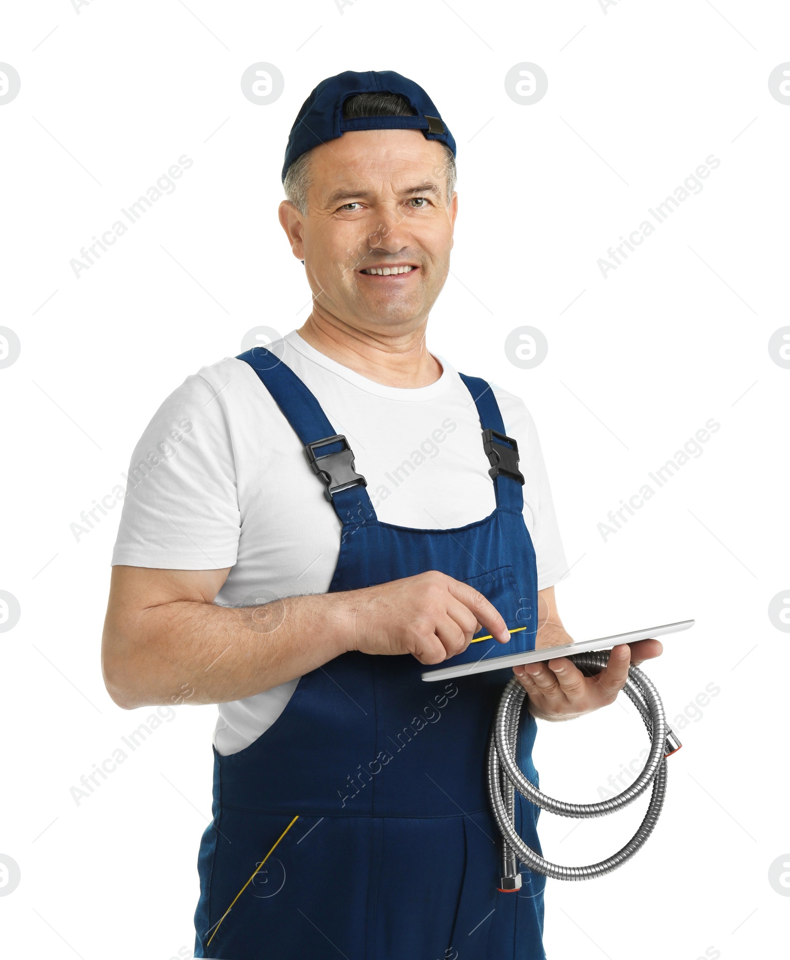 Photo of Mature plumber with tablet computer and hose on white background