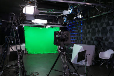 Modern video recording studio with professional cameras