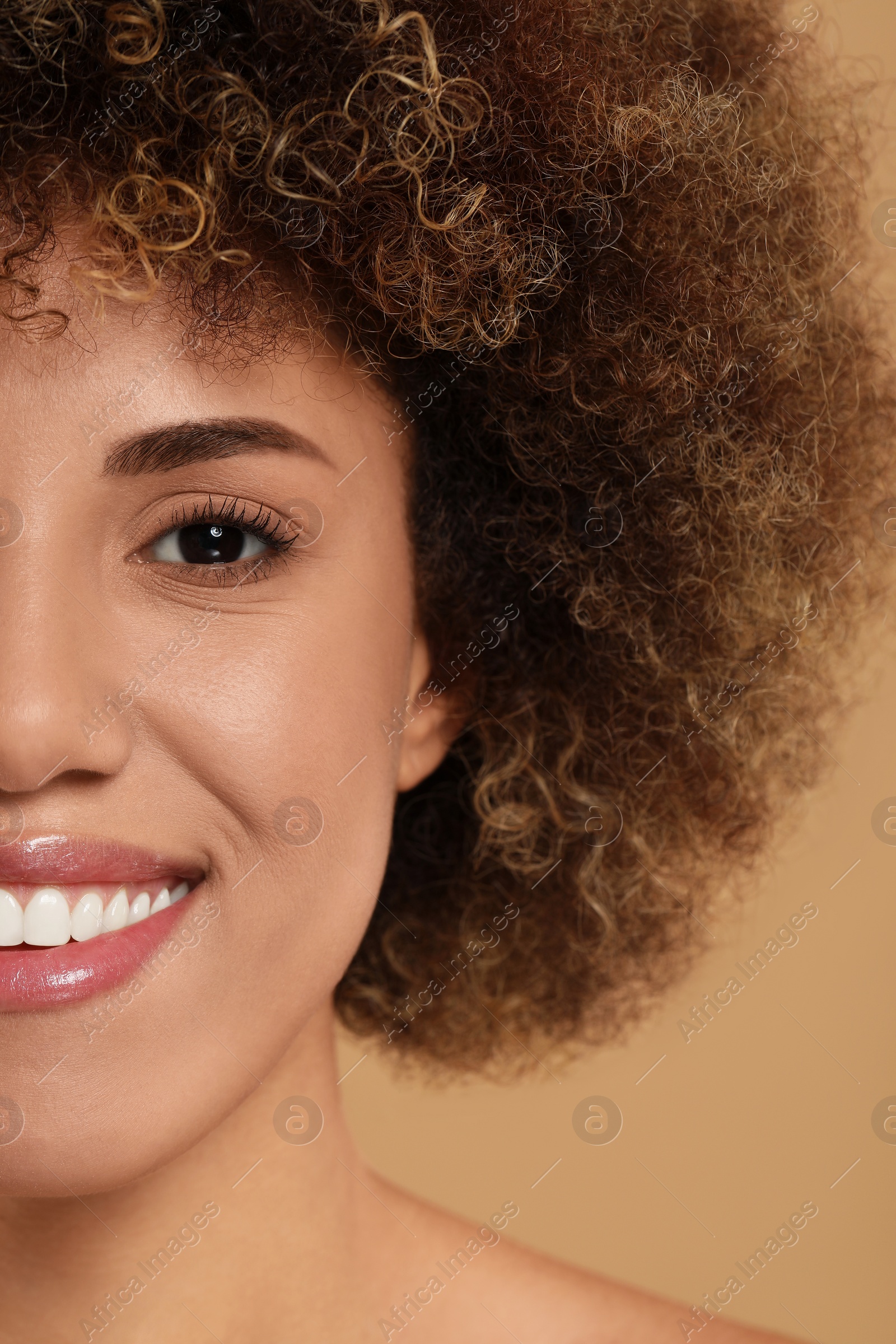 Photo of Beautiful woman with healthy skin on beige background, closeup