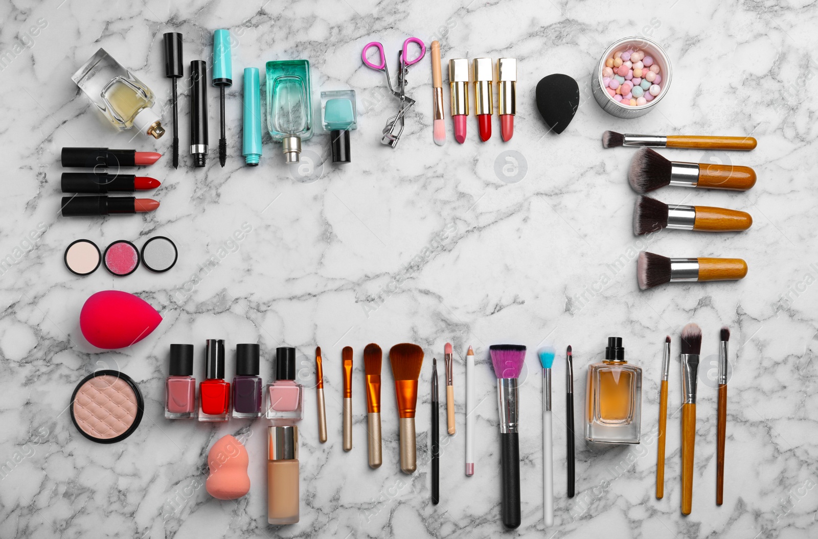 Photo of Flat lay composition with cosmetic products on marble background