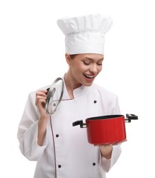 Photo of Happy woman chef in uniform holding cooking pot on white background