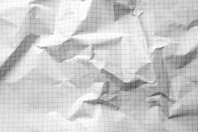 Photo of Crumpled sheet of paper as background, closeup