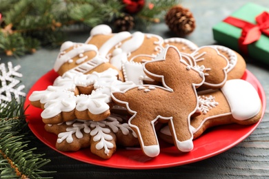 Photo of Delicious Christmas cookies on blue wooden table, closeup