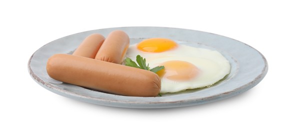 Photo of Delicious boiled sausages, fried eggs and parsley isolated on white