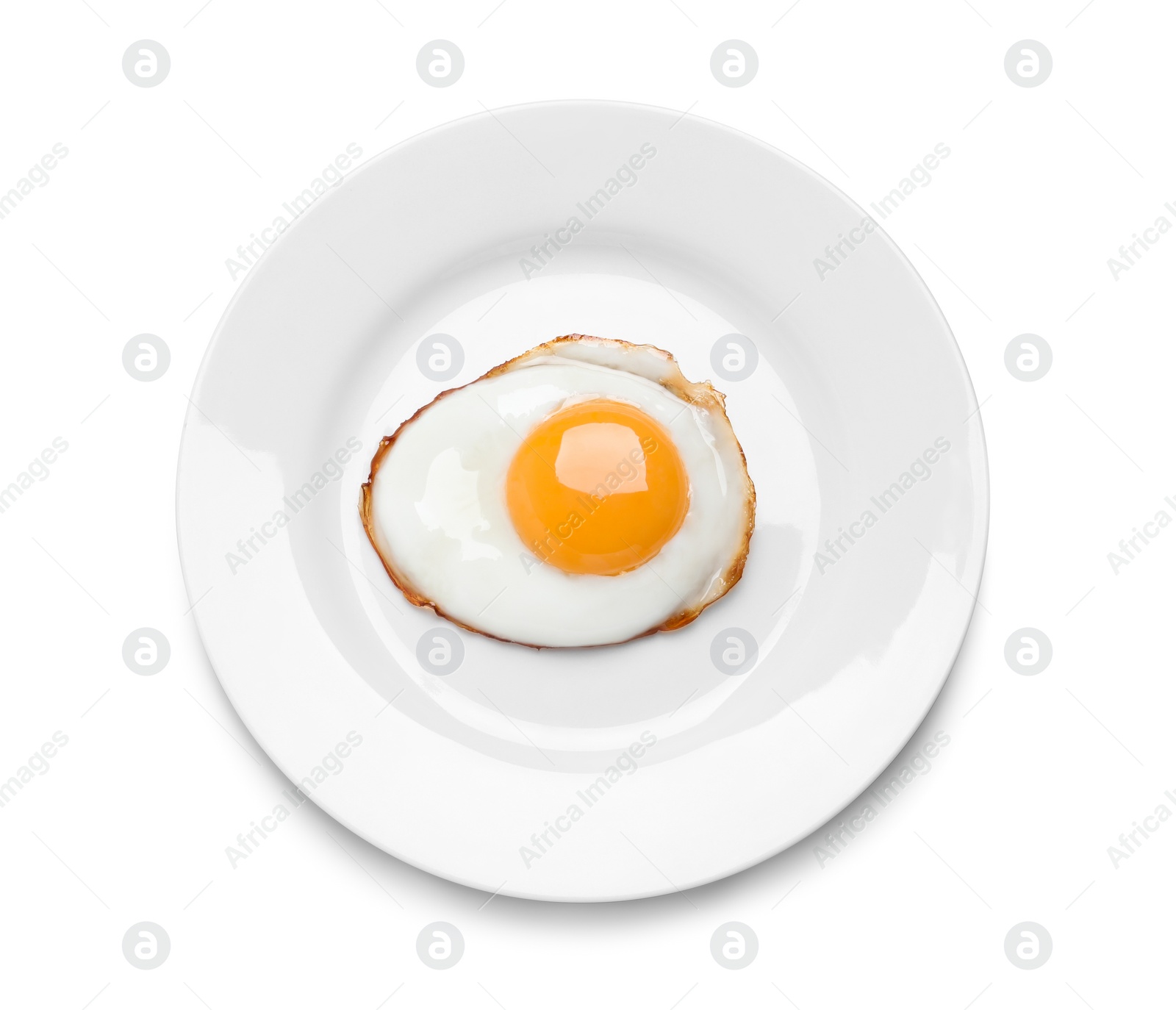 Photo of Plate with delicious fried egg isolated on white, top view