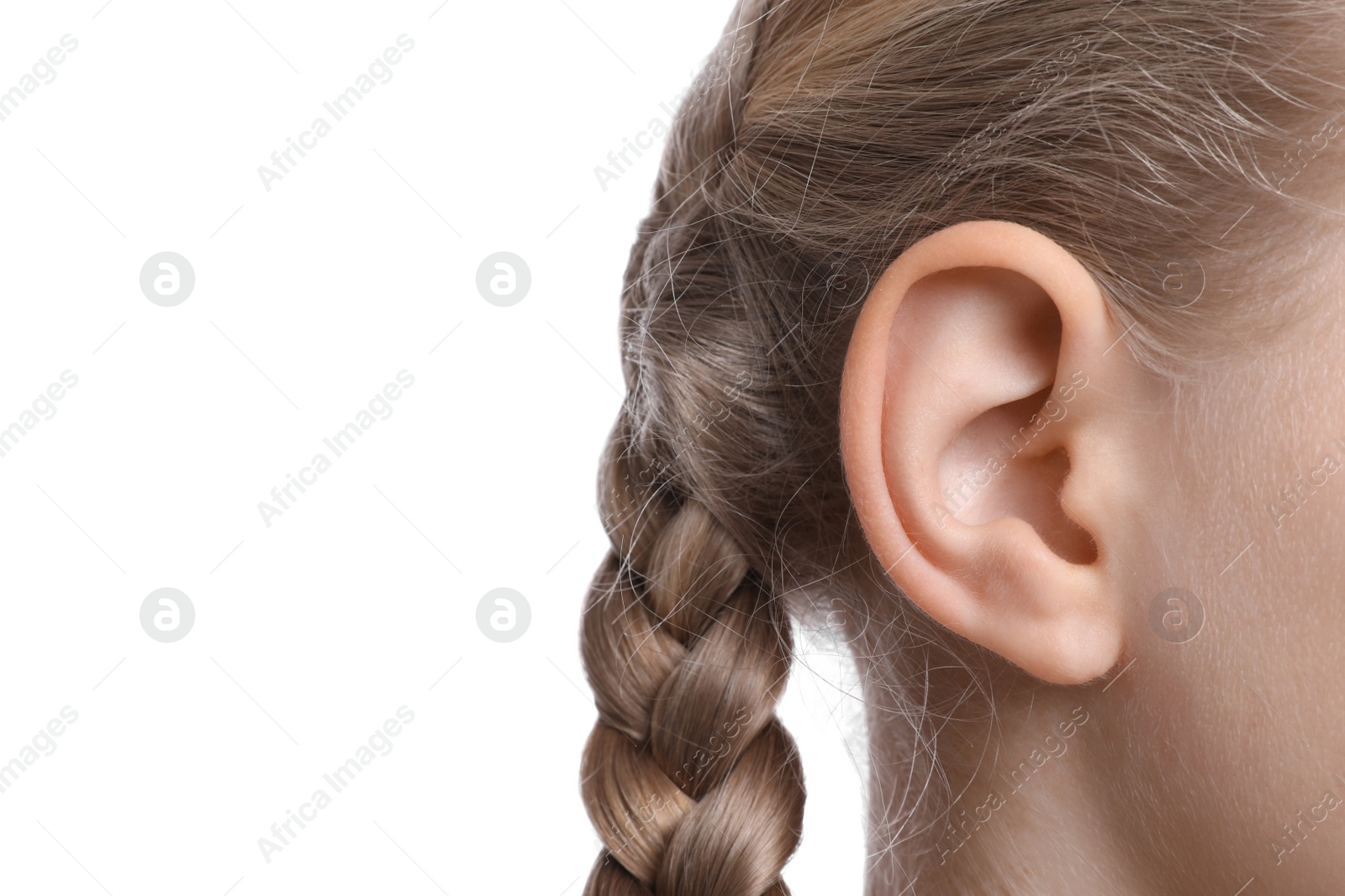 Photo of Cute little girl on white background, closeup of ear