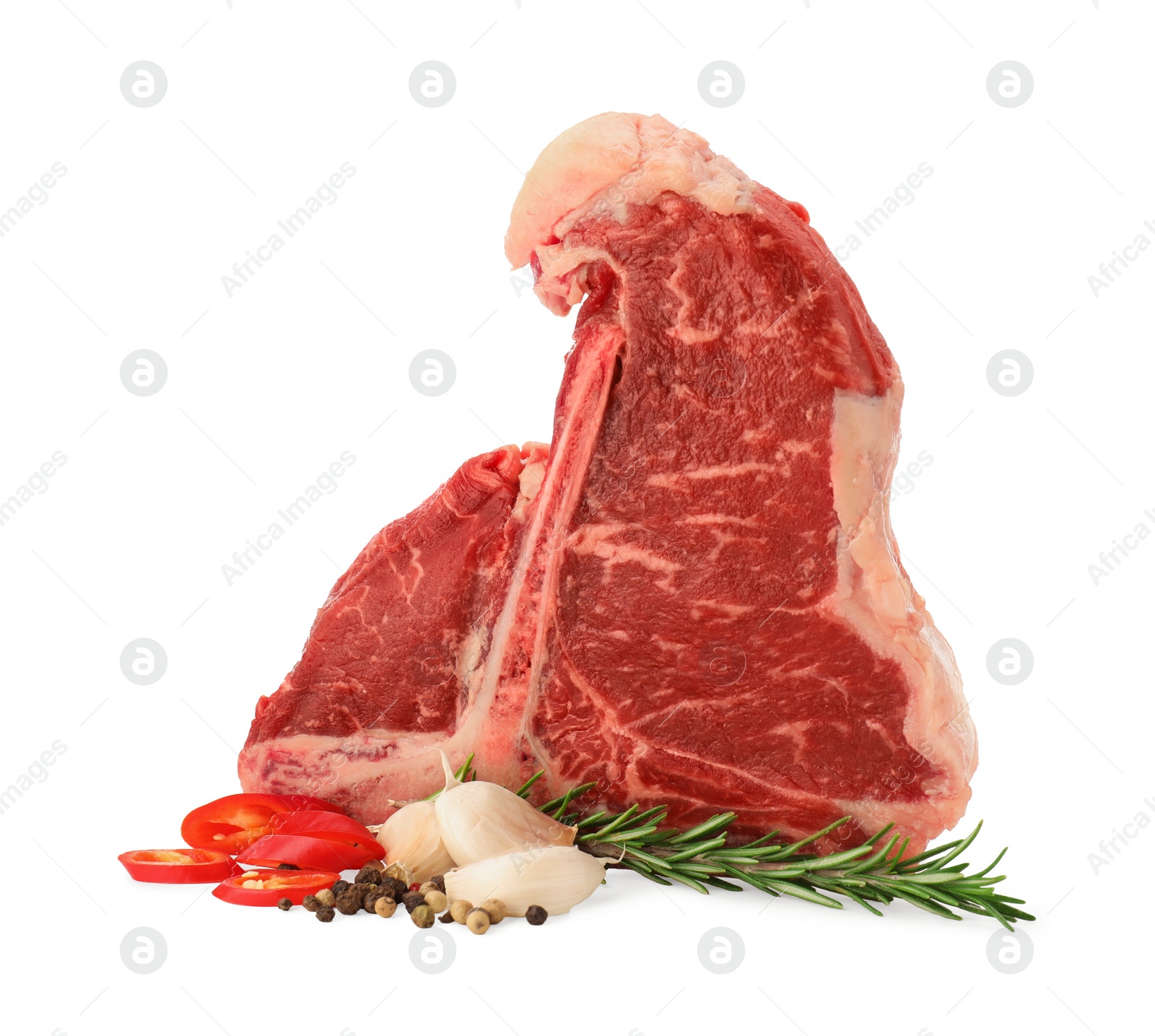 Photo of Raw t-bone beef steak and spices isolated on white