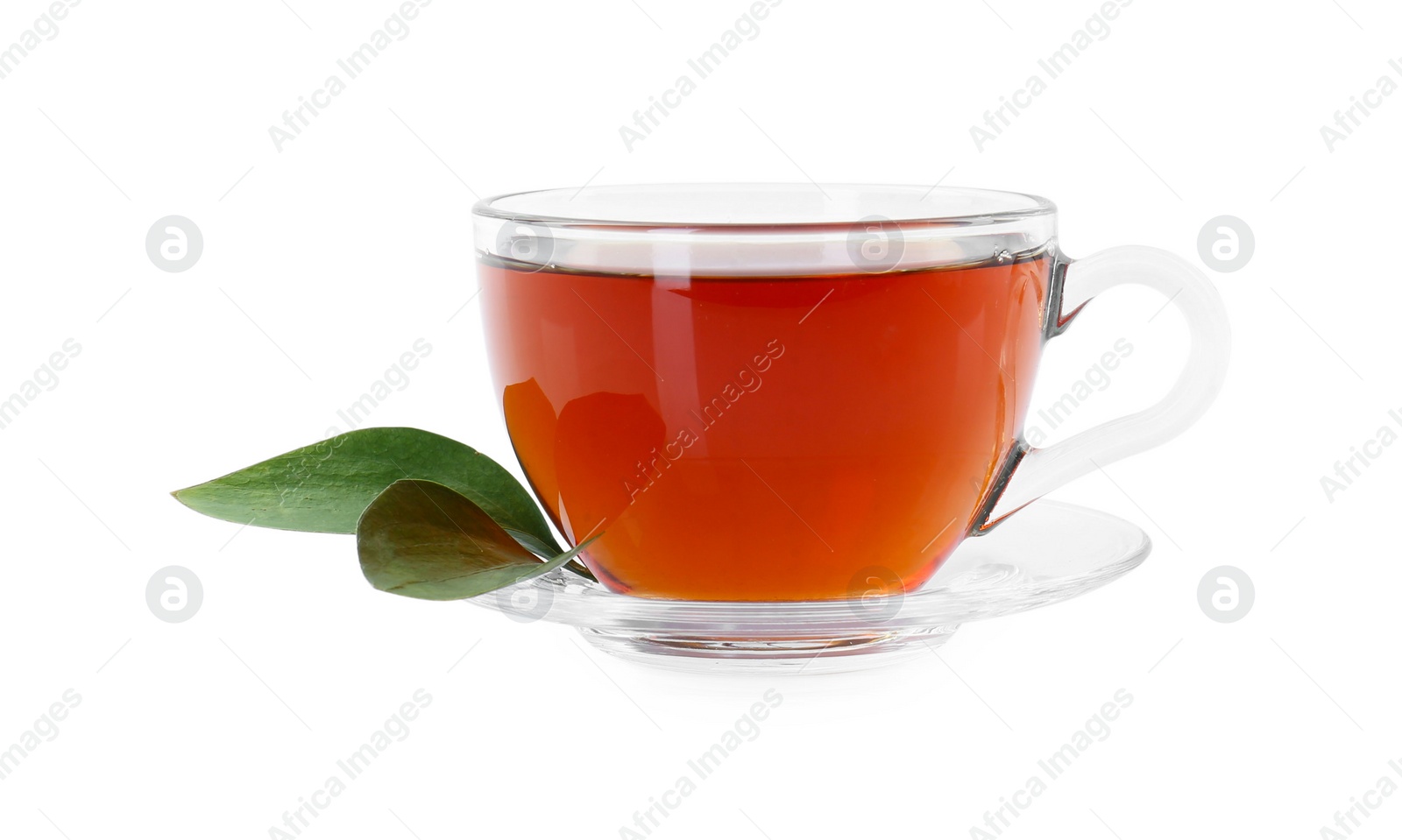 Photo of Tasty tea in cup and green leaves isolated on white