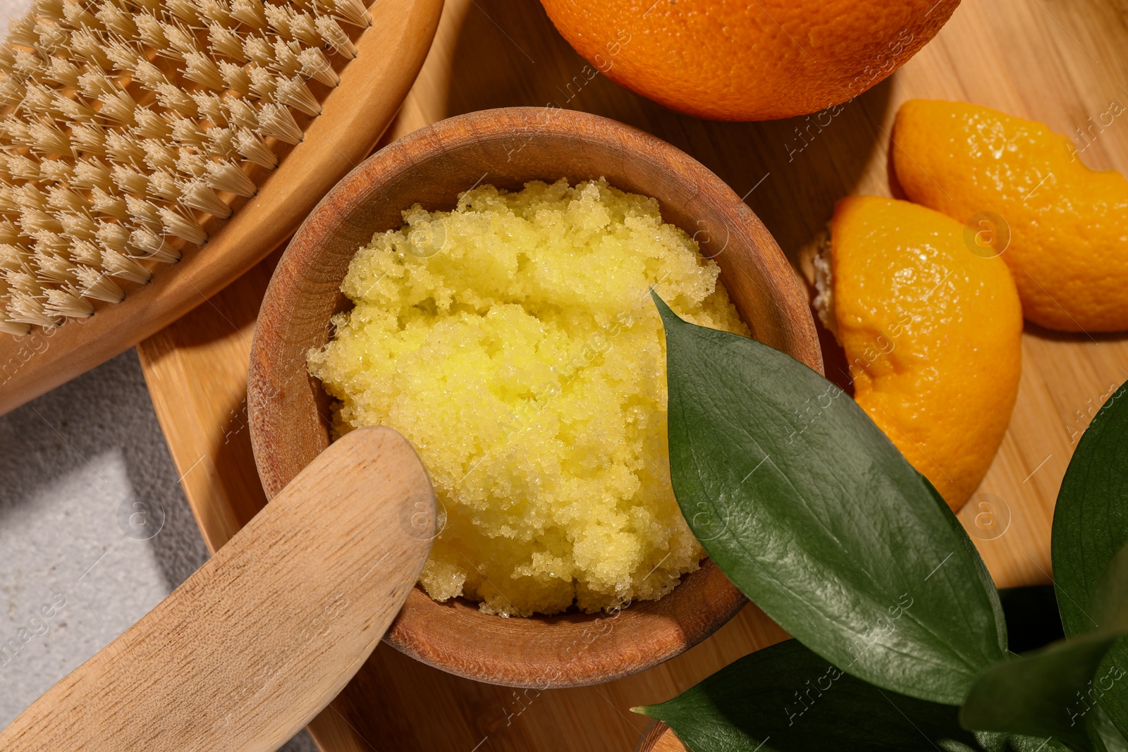 Photo of Flat lay composition with natural body scrub on light table. Anti cellulite treatment