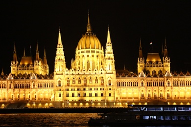 BUDAPEST, HUNGARY - APRIL 27, 2019: Beautiful night cityscape with illuminated Parliament Building