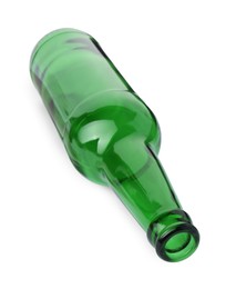 One empty green beer bottle isolated on white