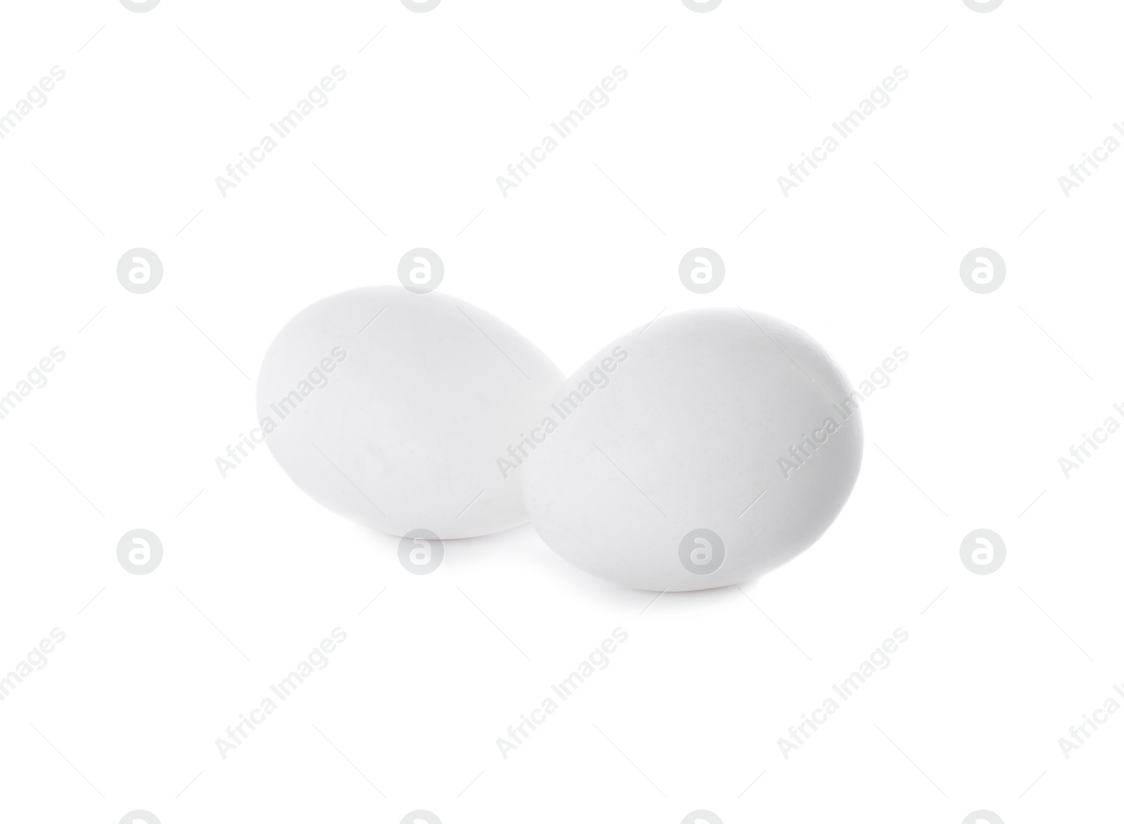 Photo of Fresh raw chicken eggs isolated on white