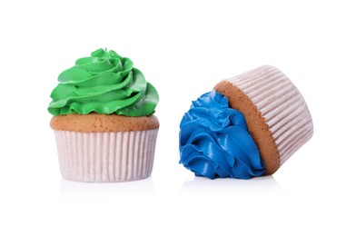 Photo of Dropped and good cupcakes on white background. Troubles happen