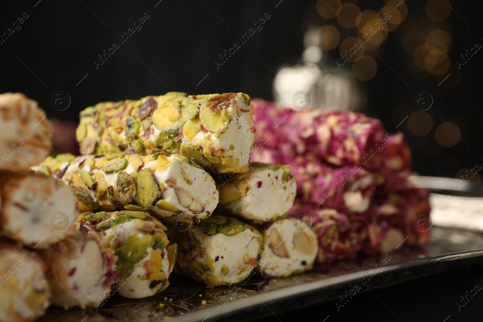 Photo of Turkish delight dessert on tray, closeup. Traditional sweet