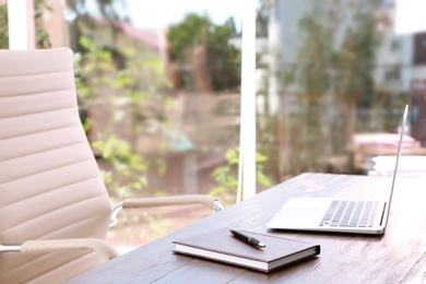 Photo of Lawyer's workplace with laptop in office