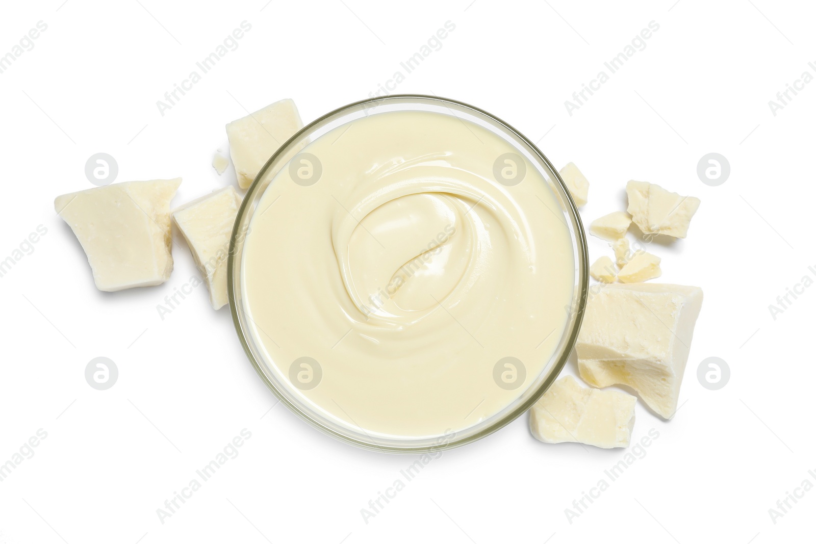 Photo of Tasty chocolate paste in bowl and pieces isolated on white, top view