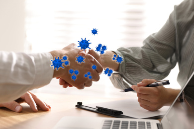 Image of Avoid physical contact during coronavirus outbreak. People shaking hands, closeup