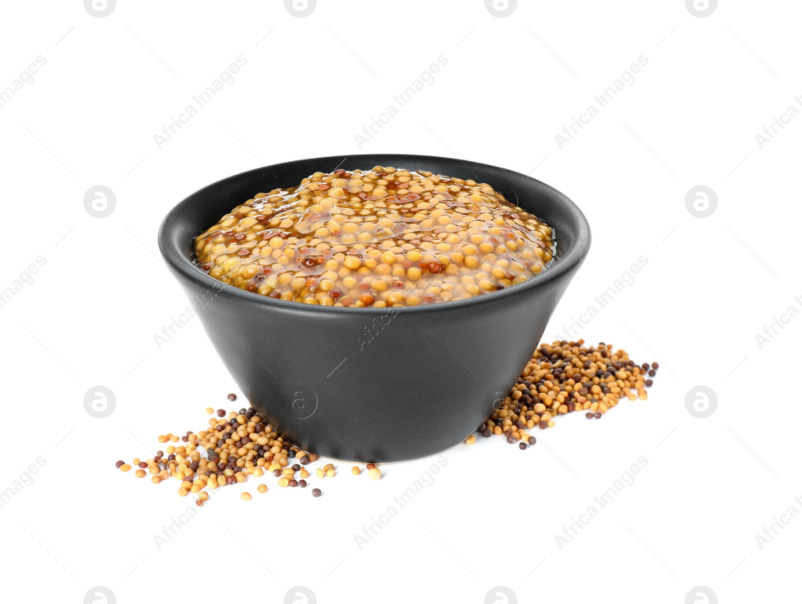 Photo of Fresh whole grain mustard in bowl and dry seeds isolated on white