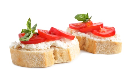 Photo of Tasty fresh tomato bruschettas on white background