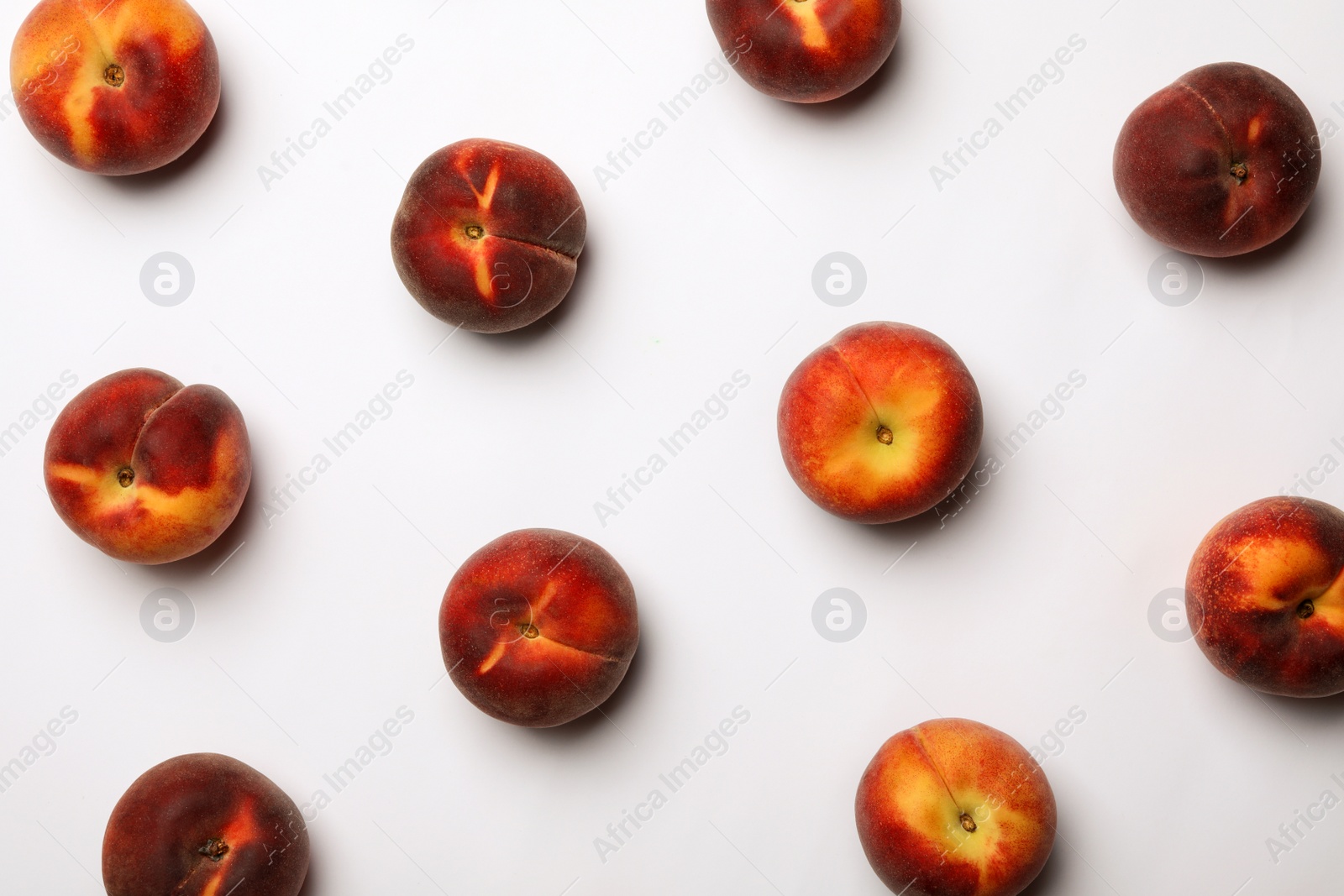 Photo of Flat lay composition with sweet juicy peaches on light background