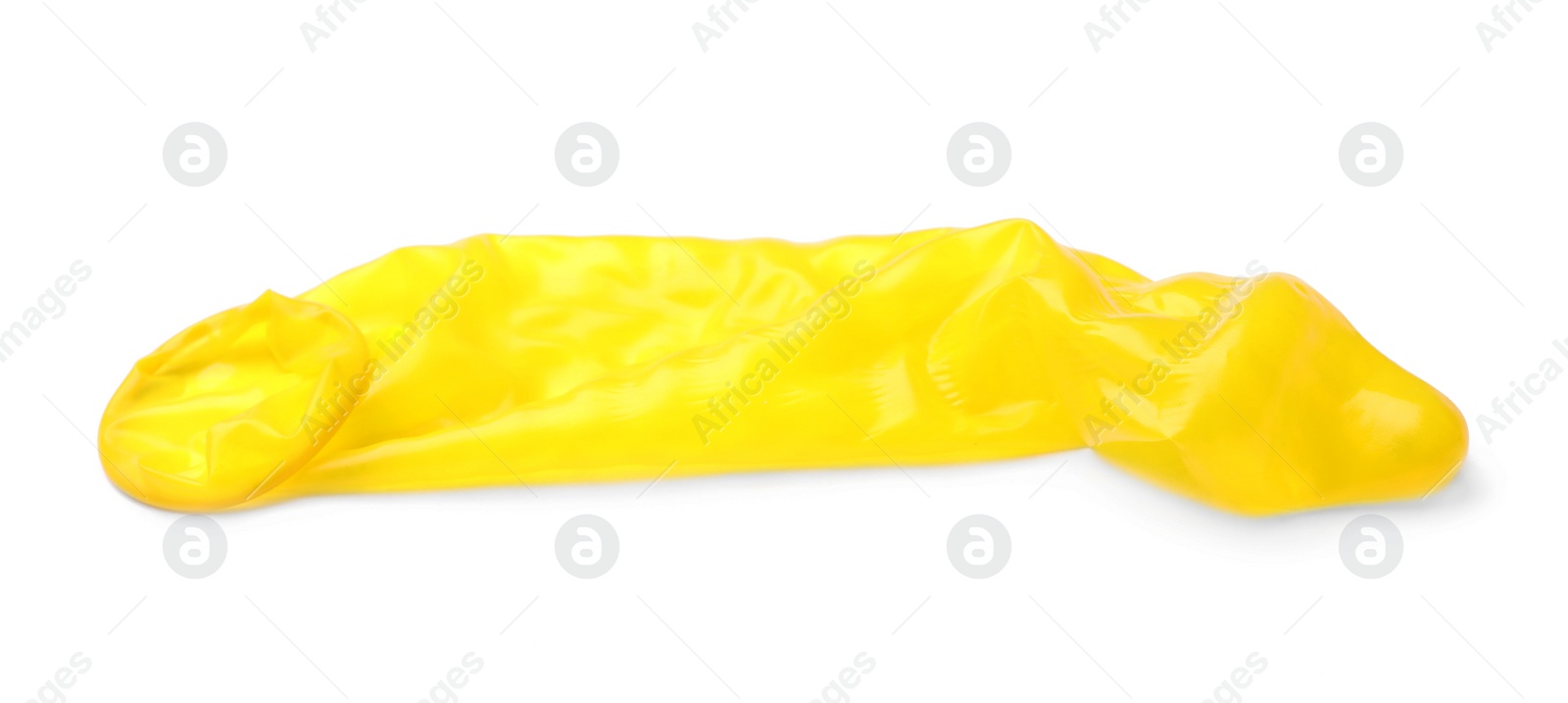 Photo of Yellow used condom on white background. Safe sex concept