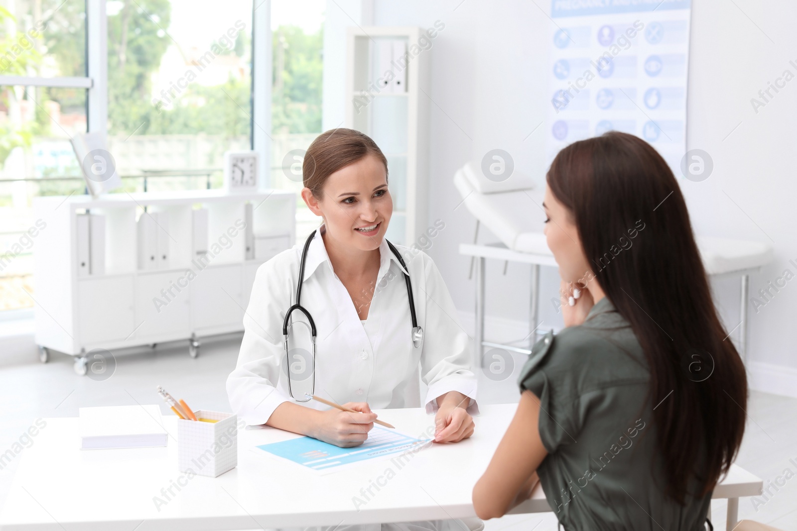 Photo of Patient having appointment with doctor in hospital