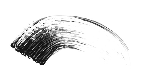 Photo of Smear of black mascara isolated on white, top view