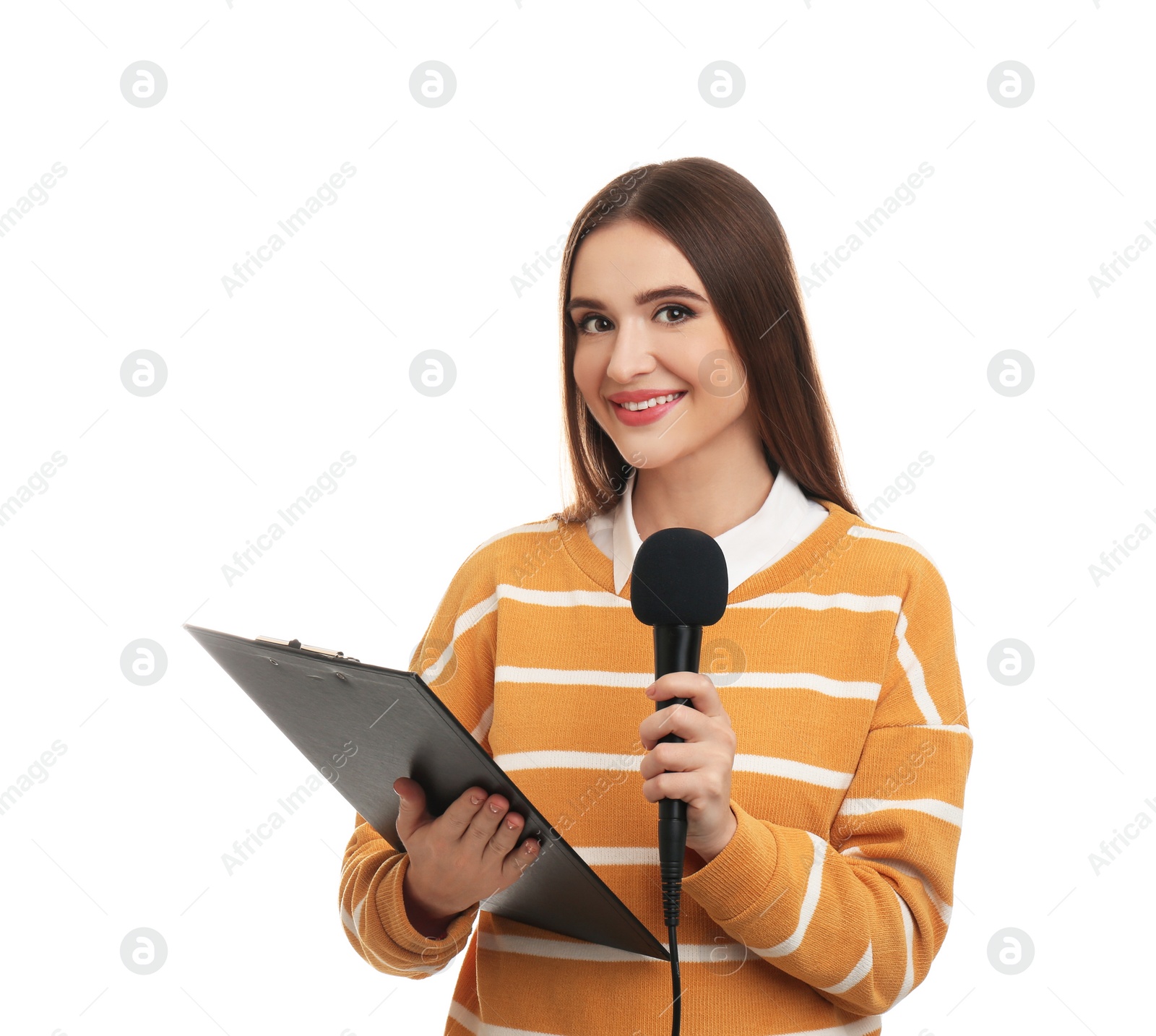 Photo of Young female journalist with microphone and clipboard on white background