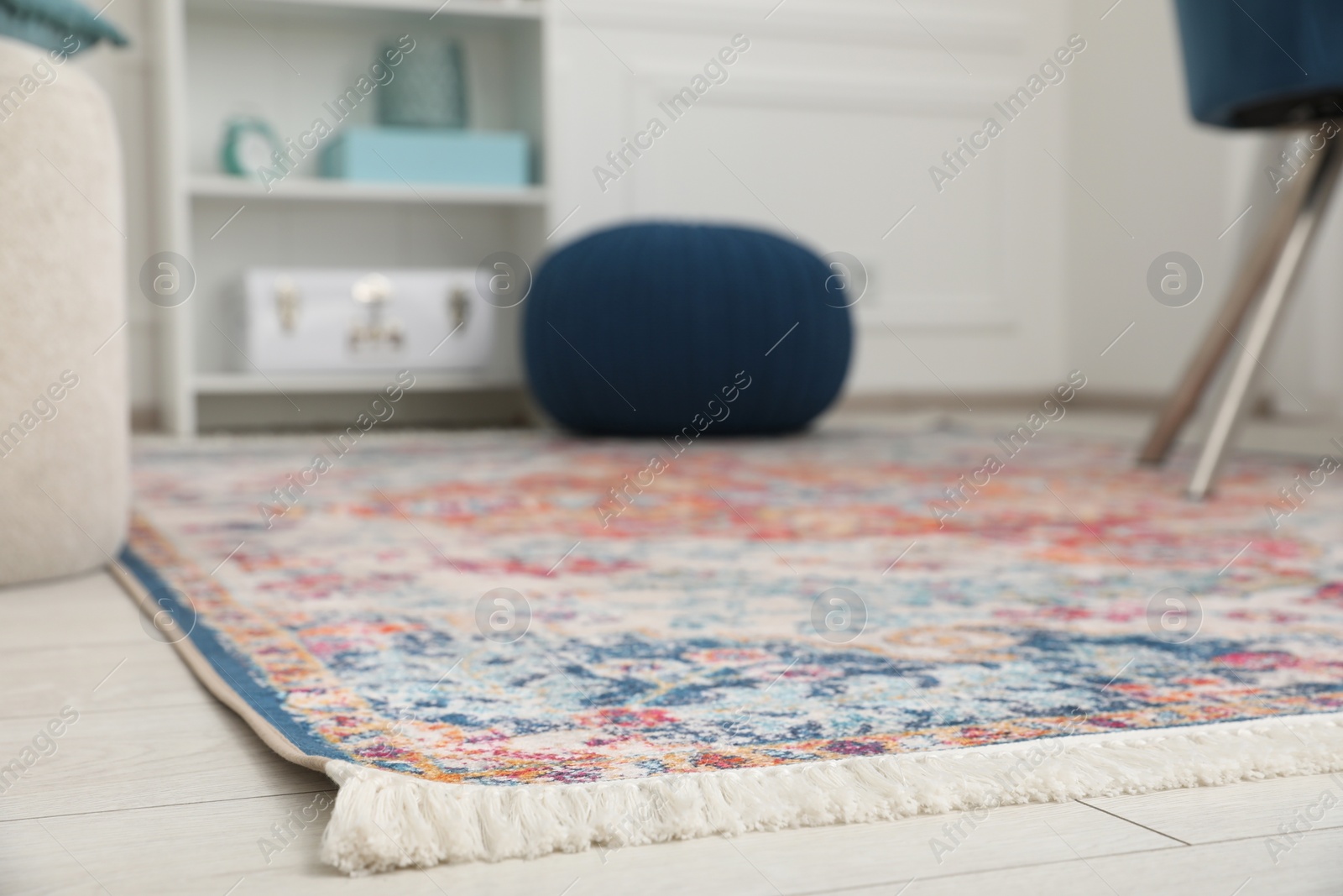 Photo of Stylish rug and furniture in room. Interior design