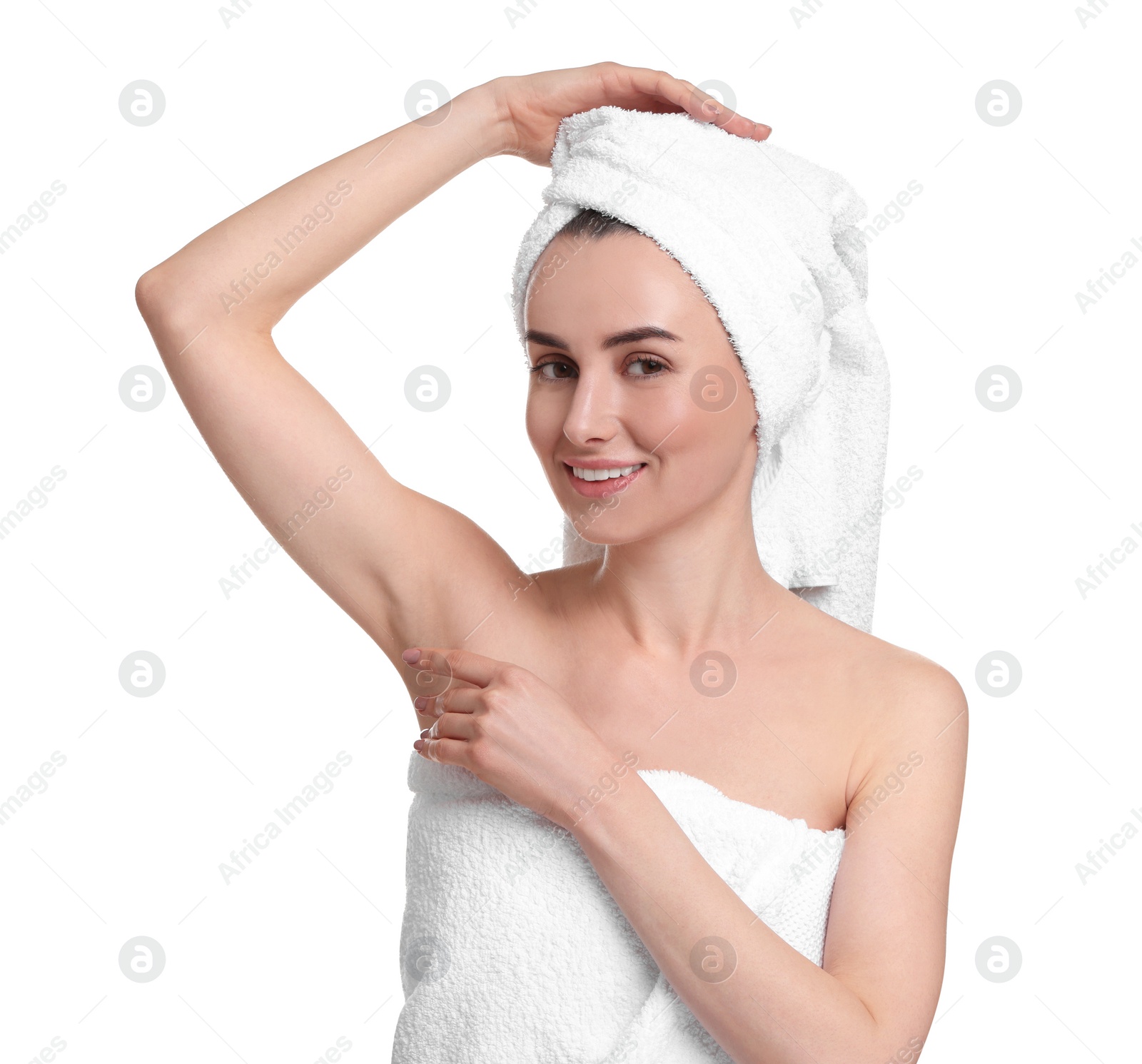 Photo of Beautiful woman showing armpit with smooth clean skin on white background