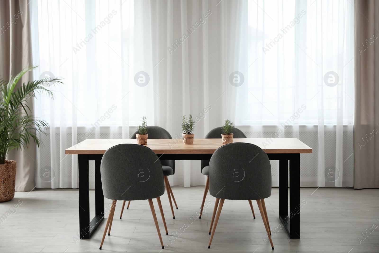 Photo of Modern room interior with chairs and table