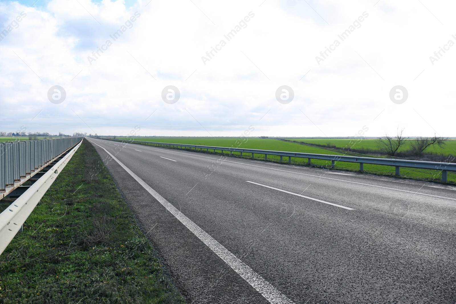 Photo of Beautiful view of asphalt highway without transport