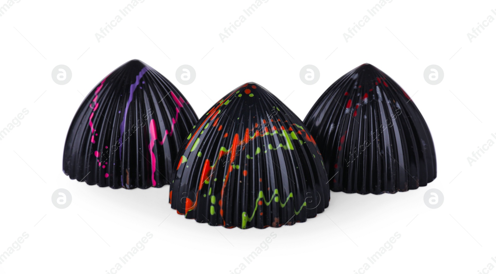 Photo of Many tasty chocolate candies on white background