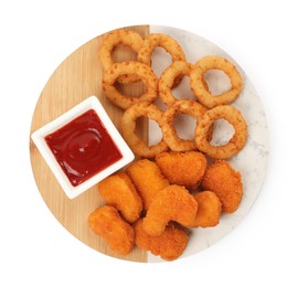 Photo of Tasty fried onion rings, chicken nuggets and ketchup isolated on white, top view