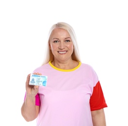 Happy mature woman with driving license on white background