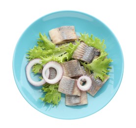 Photo of Blue plate with delicious salted herring slices, lettuce and onion rings isolated on white, top view